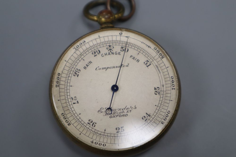 E. Saunders, 100, High Street, Oxford. A brass cased pocket barometer, cased